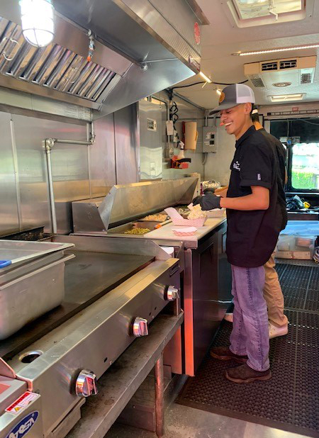 a person cooking in a restaurant