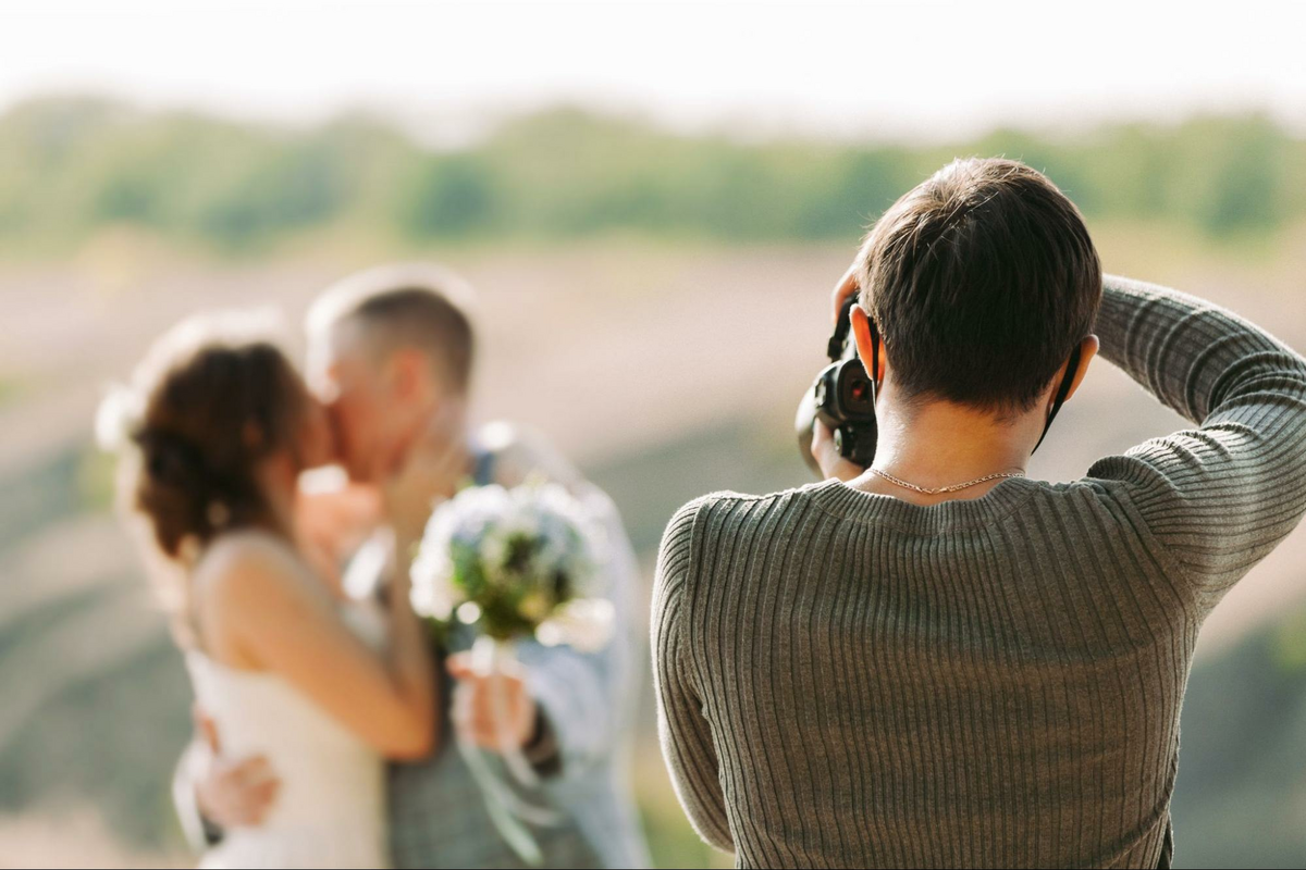 a man and a woman standing next to each other