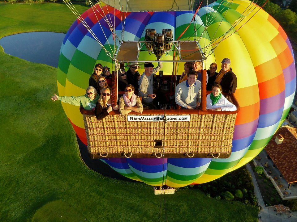 a group of people in a hot air balloon